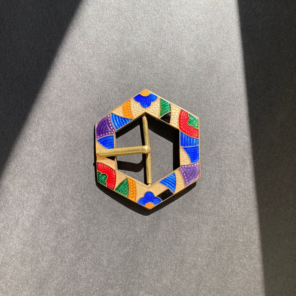 Multi-colored art deco enamel belt buckle.